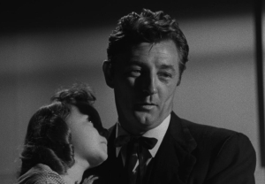 Robert Mitchum in La morte corre sul fiume (1955)